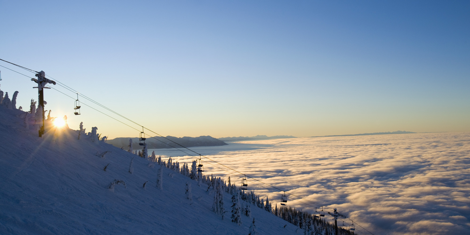 ski lift above the clouds
